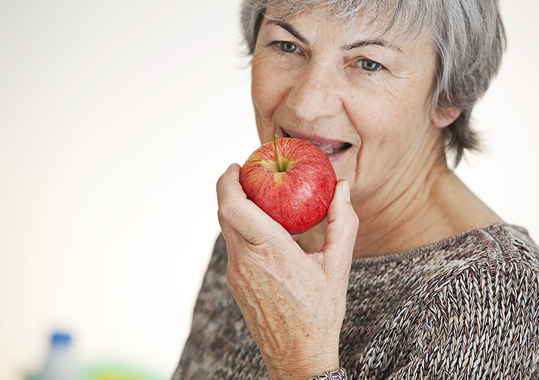 Girl eating an apple